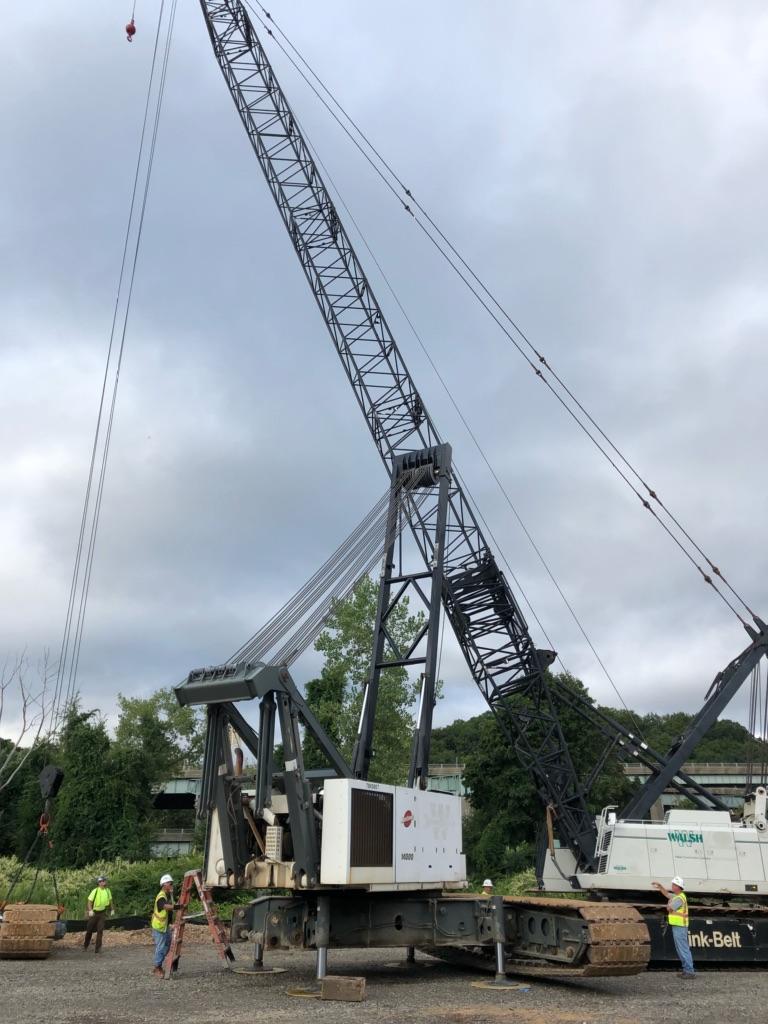 Crane used for trestle (work platform) and temporary bridge construction
